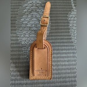 Louis Vuitton mini luggage tag